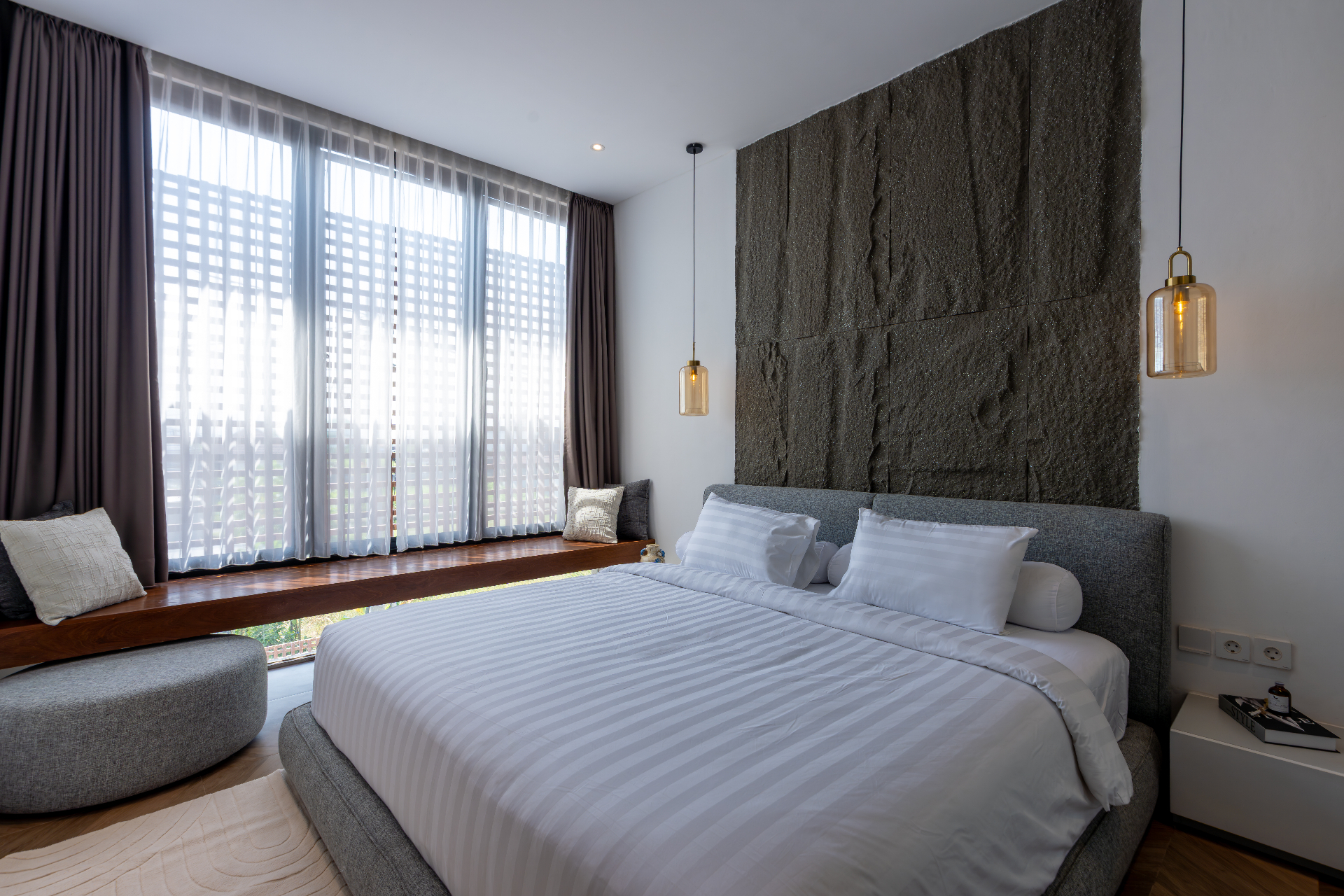 Second bedroom with andesite headboard and teak window-bench